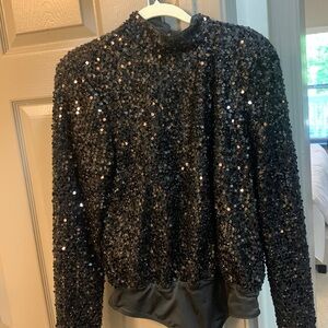 Black sequin long sleeve body suit. Open back